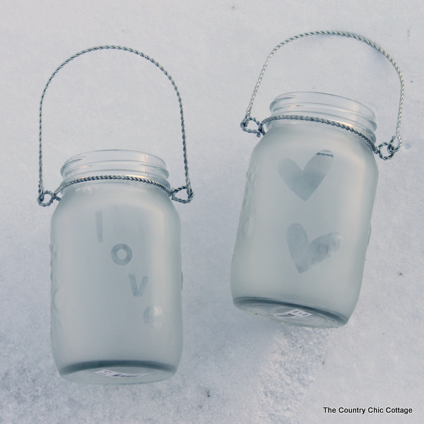 Glass etched mason jar lanterns -- perfect for weddings and so easy to make! I had no idea they made etching cream that you could re-use over and over!