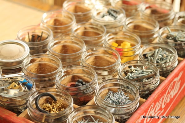 hardware organized into mason jars