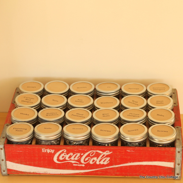 Mason jar hardware organizer -- an old coke crate and mason jars can organize your screws, nails, bolts, and more!