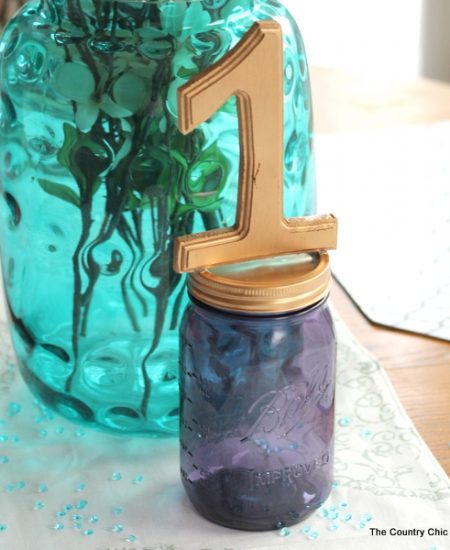 Mason jar table number for weddings -- a quick and easy way to make table numbers for your event!