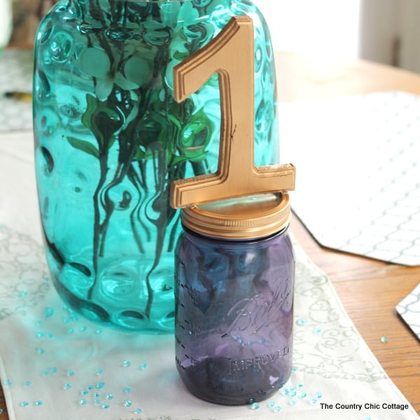 Mason jar table number for weddings -- a quick and easy way to make table numbers for your event!