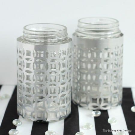 Wrap jars in metal for a gorgeous candle holder perfect for weddings or everyday use! These metal wrapped jar candle holders are so easy to make. Adding this to my must make list!