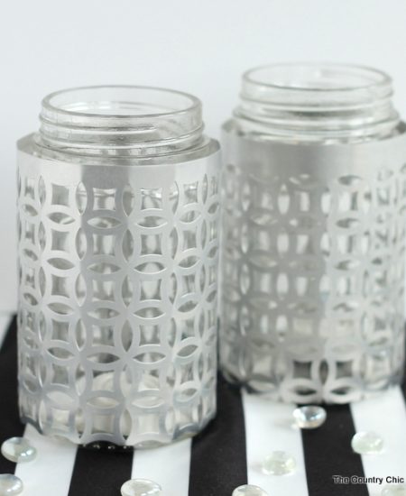 Wrap jars in metal for a gorgeous candle holder perfect for weddings or everyday use! These metal wrapped jar candle holders are so easy to make. Adding this to my must make list!