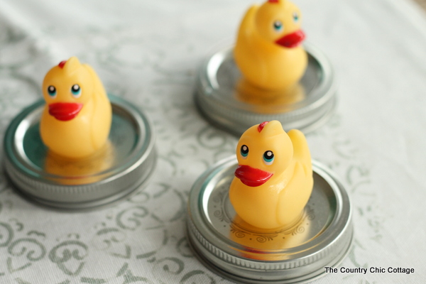 rubber ducks on mason jar lid