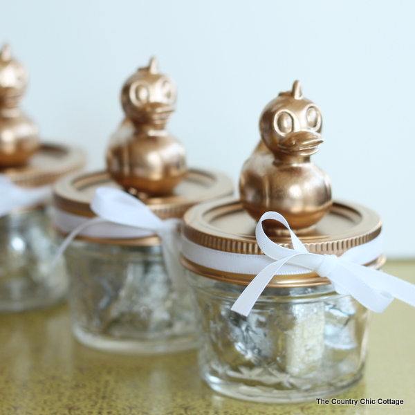 rubber ducks attached to top of mason jar lid