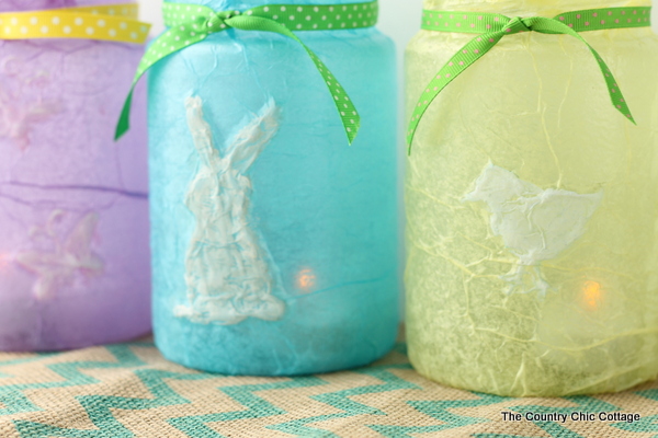 purple, blue, and yellow decoupaged jars with easter shapes