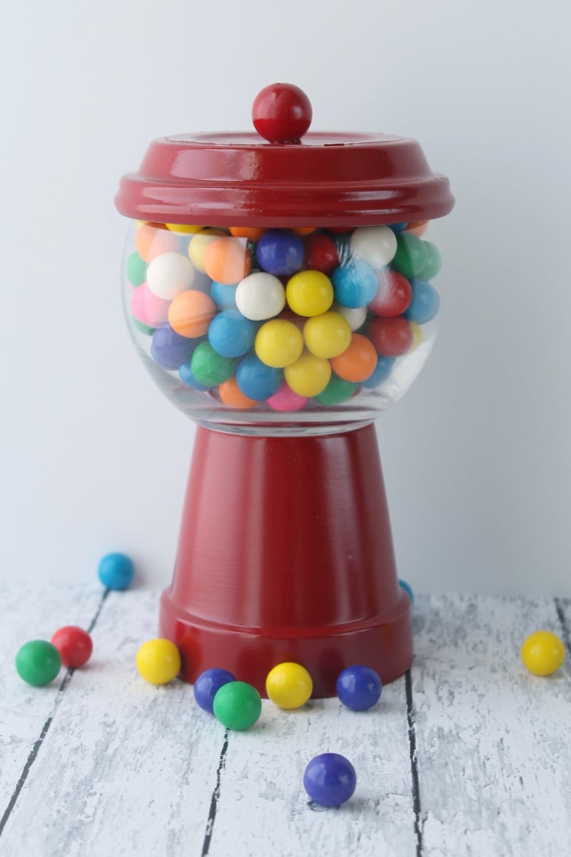 Image of terra cotta pot as a gumball machine