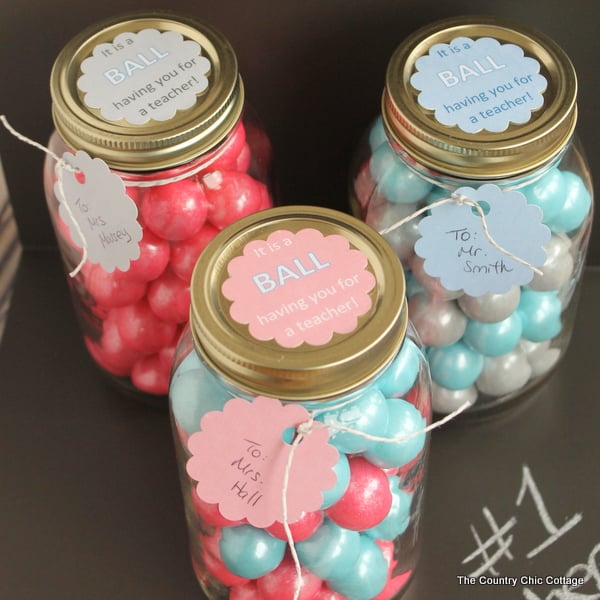 multiple mason jars filled with gumballs