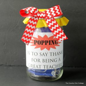 Popcorn Teacher Gift in a Jar -- print this free printable label and add popcorn to a fun gift in a jar for any teacher!