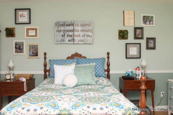 bed and wall decor behind the bed