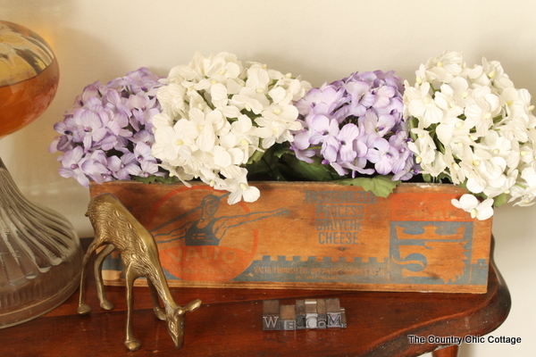 Gorgeous foyer makeover with a chair from Sauder furniture.  Love the rustic farmhouse details!