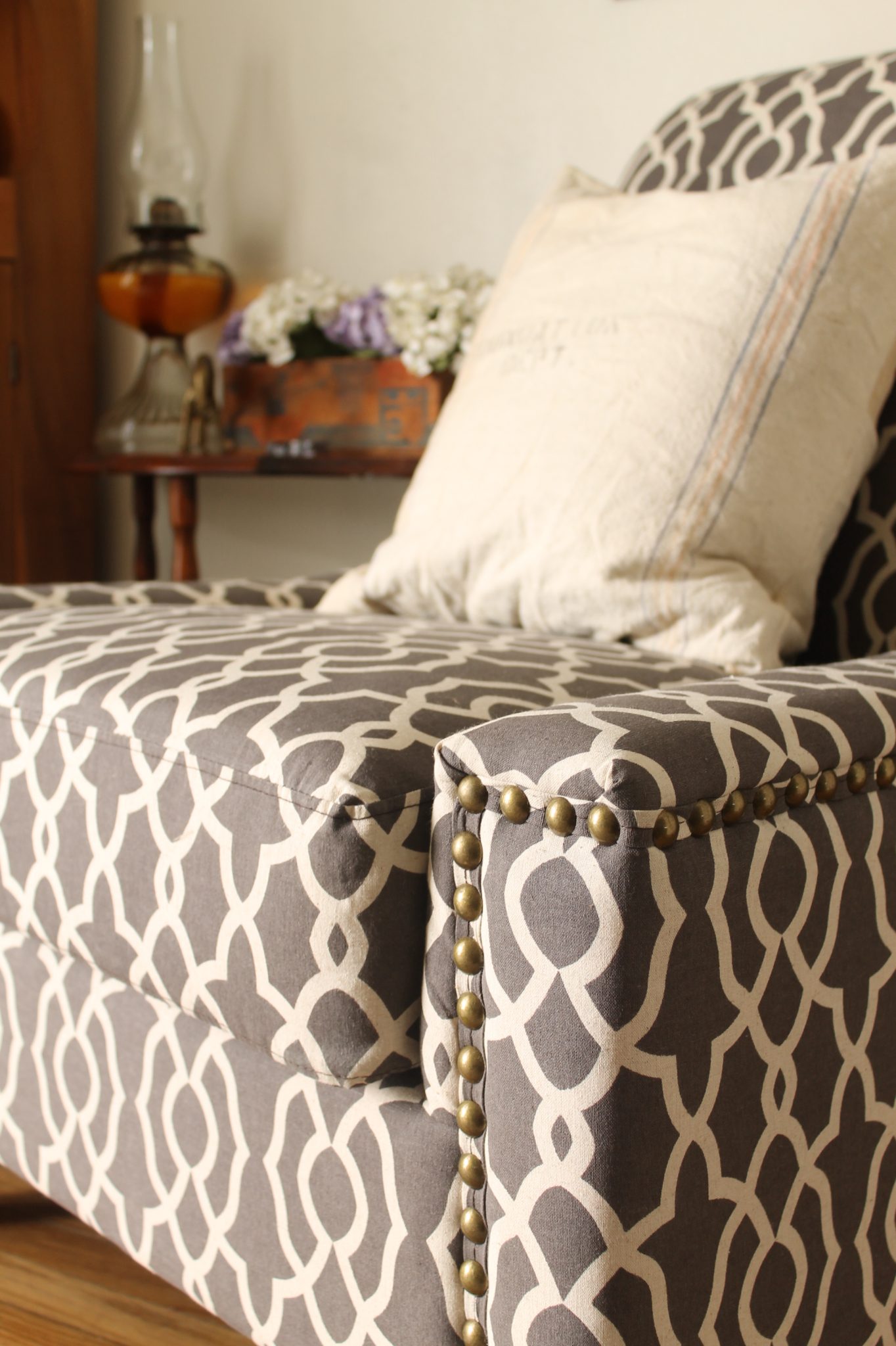 Gorgeous foyer makeover with a chair from Sauder furniture.  Love the rustic farmhouse details!