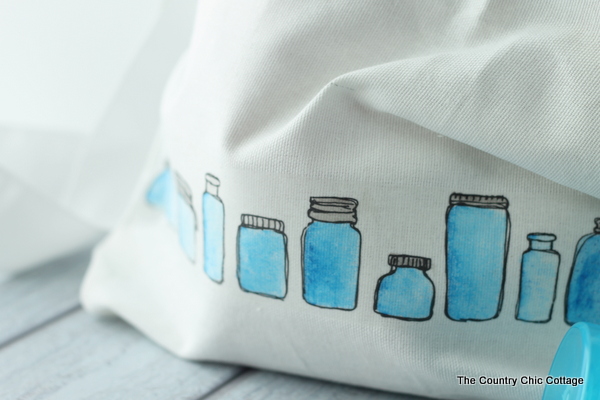 tote with colored jar images