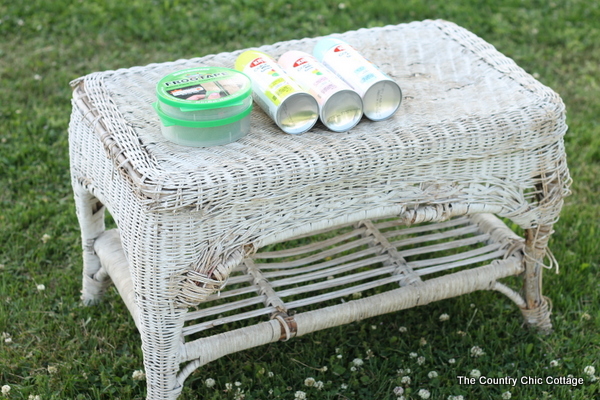 Painted Wicker Table -- add a design to wicker with spray paint with just a few supplies.  Come see the step by step instructions!