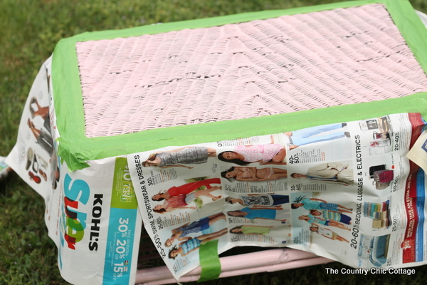 using newspaper to protect the rest of the table from overspray