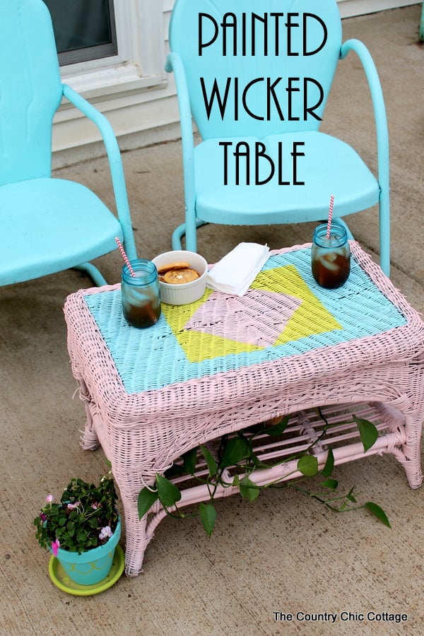 Painted Wicker Table -- add a design to wicker with spray paint with just a few supplies. Come see the step by step instructions!