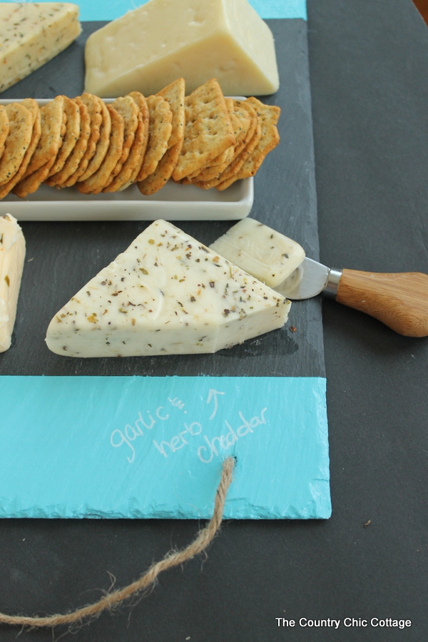 Slate Cheese Tray -- add colorful chalkboard stripes to the edge with this method and have a slate cheese tray for your next party!