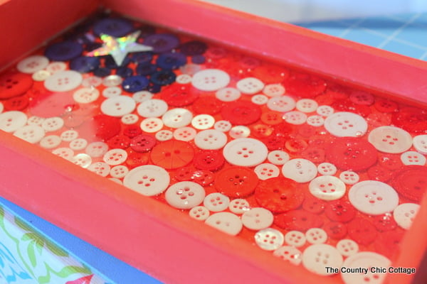 Making a patriotic button flag tray.