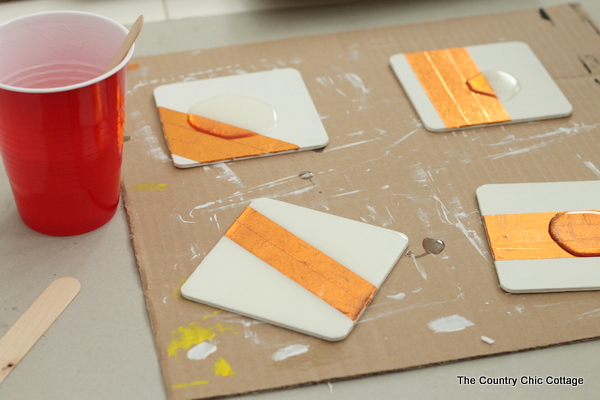 applying epoxy to square coasters