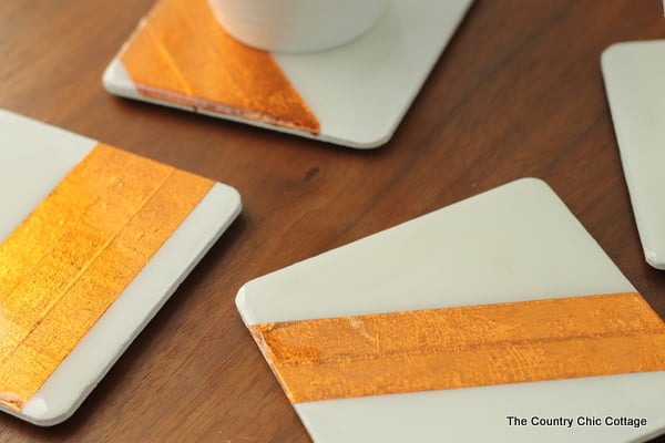 white coasters with copper tape