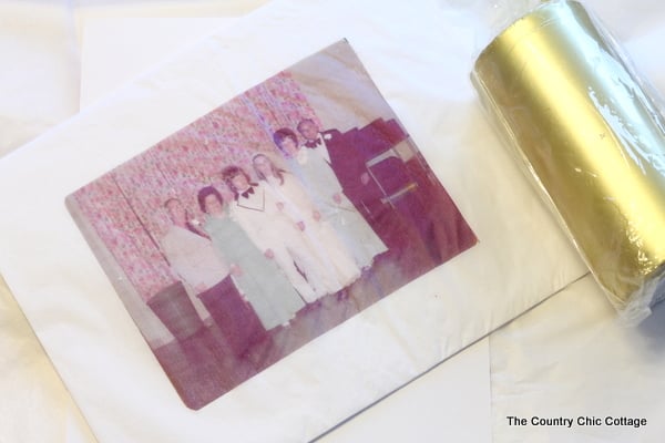 Gold candle with family photo