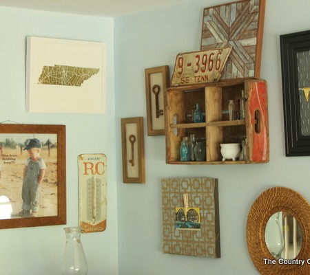 A rustic farmhouse gallery wall like this one will add character to your farmhouse style home.