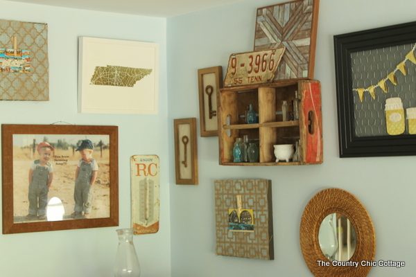 A rustic farmhouse gallery wall like this one will add character to your farmhouse style home.