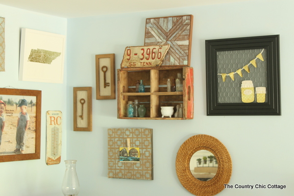 A rustic farmhouse gallery wall like this one will add character to your farmhouse style home.