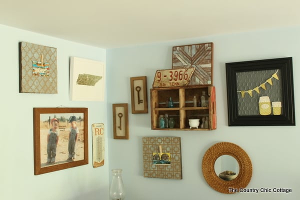 A rustic farmhouse gallery wall like this one will add character to your farmhouse style home.