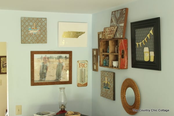 A rustic farmhouse gallery wall like this one will add character to your farmhouse style home.