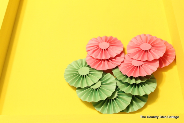 Make this rosette shadowbox art for your home! Super easy to make with a rosette craft kit!