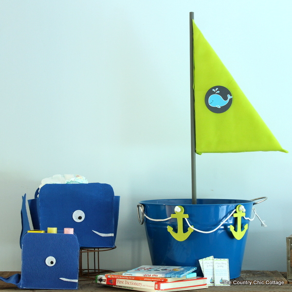 nautical  book boat with blue felt whales and stacks of books