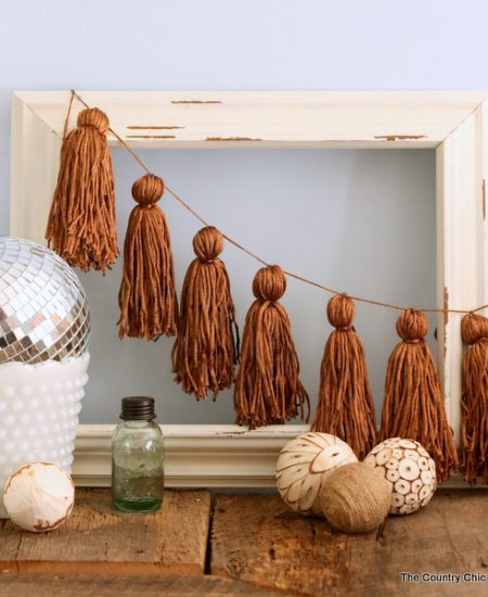 Make this yarn tassel garland for your home by following these step by step instructions!