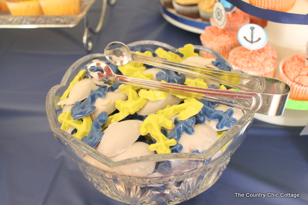Fun nautical themed desserts help bring the baby shower decor together.