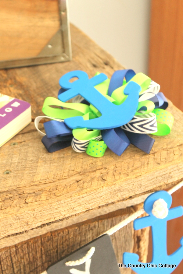Nautical themed corsage for the mom to be with some extra ribbons