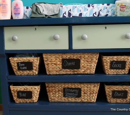 Turn a dresser into a changing table and more ideas in this nautical themed nursery!