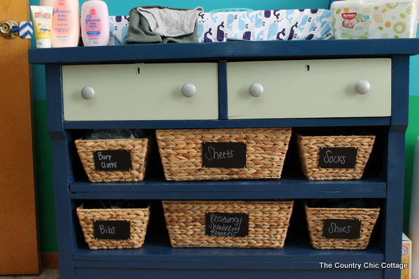 Turn a dresser into a changing table and more ideas in this nautical themed nursery!