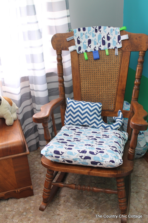 Turn a dresser into a changing table and more ideas in this nautical themed nursery!