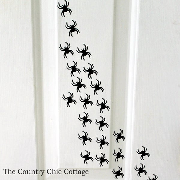 Add spiders to your door for a fun Halloween decoration!