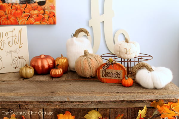 handmade fall crafts on a mantel