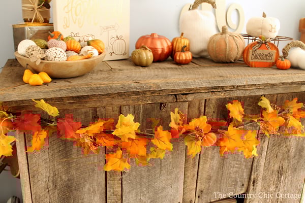 fall leaves on a mantel
