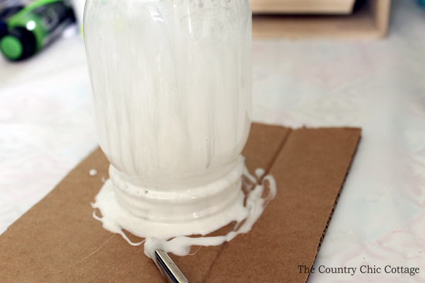 painting a mason jar white