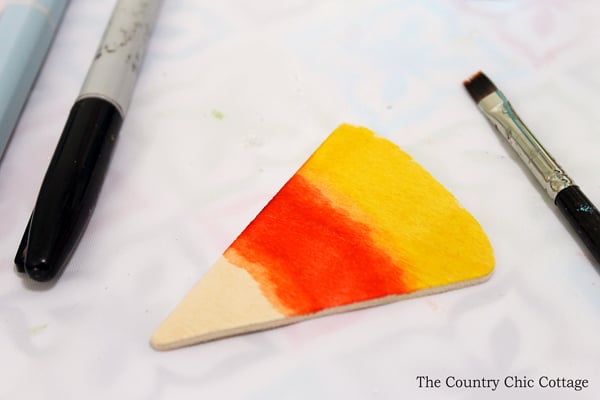 Blending in the colors at the ends of the candy corn piece