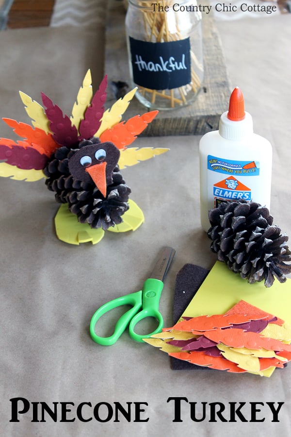 These pinecone turkeys are a fun craft to make for Thanksgiving!  This is a great idea to let the kids make at the kids' table!  