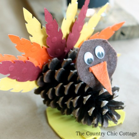 These pinecone turkeys are a fun craft to make for Thanksgiving! This is a great idea to let the kids make at the kids' table!