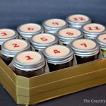 Turn a case of mason jars into an advent calendar for Christmas with this simple idea!