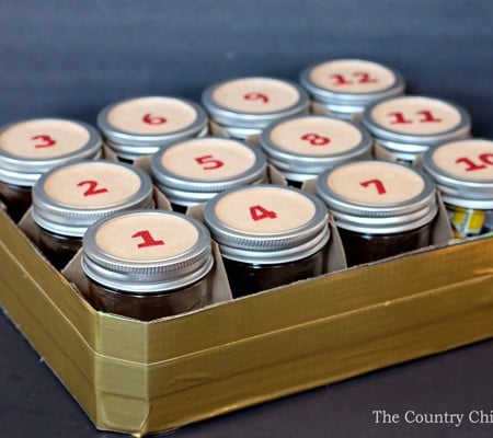 Turn a case of mason jars into an advent calendar for Christmas with this simple idea!