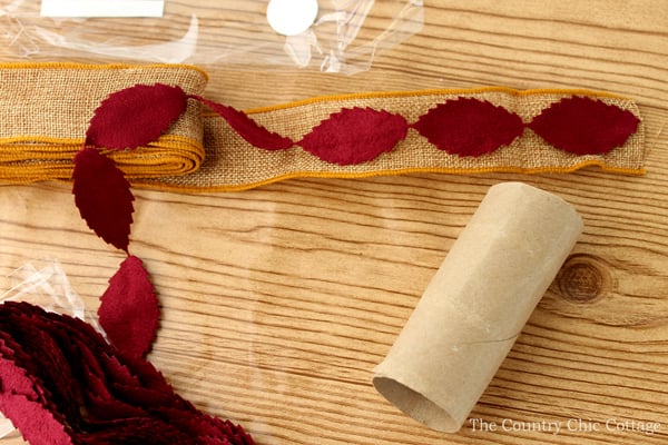 add leaves ribbon to a napkin ring