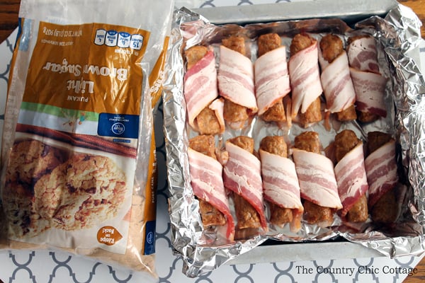 Get this recipe for brown sugar bacon wrapped sausage appetizers today! A super easy recipe that will be the hit of any holiday party!