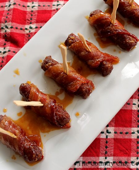 Get this recipe for brown sugar bacon wrapped sausage appetizers today! A super easy recipe that will be the hit of any holiday party!